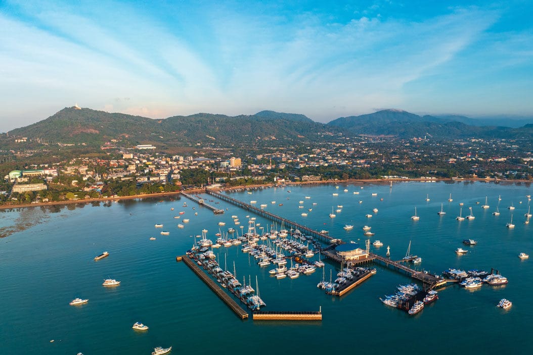 aerial-drone-view-of-chalong-pier-with-many-boats-2024-11-26-00-36-36-utc