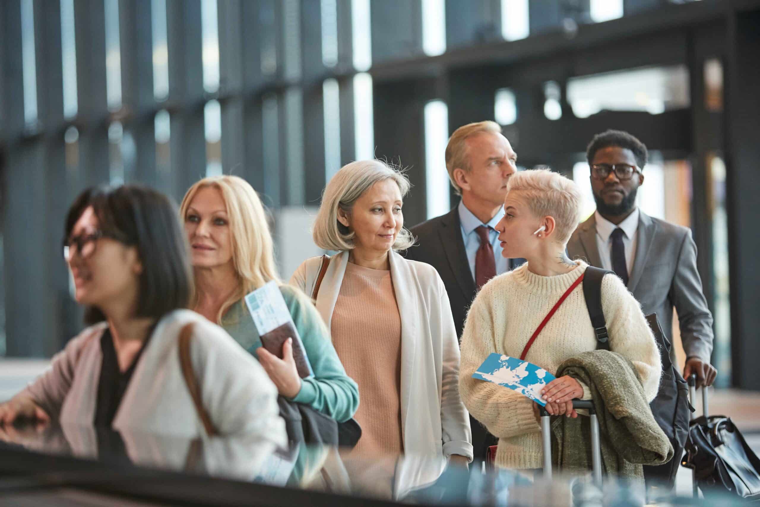 women-in-aiport-queue-2025-02-11-18-53-01-utc_11zon